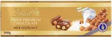 Lindt Čokoláda Gold Tablet Švýcarská Mléčná s lískovými oříšky